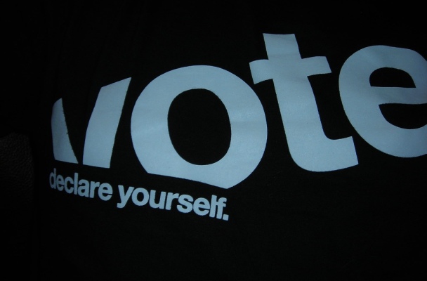 black t-shirt with words "Vote: Declare yourself" on it